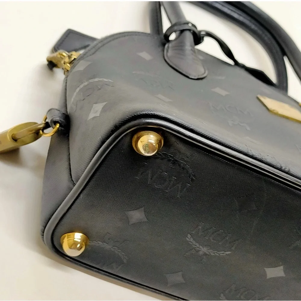 MCM Black Satchel with Gold Accents lock and key included authentic